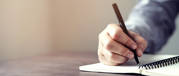 close up hand young man are sitting using pen writing Record Lec